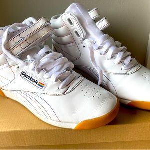 Vintage high-top Reeboks with rainbow stitching